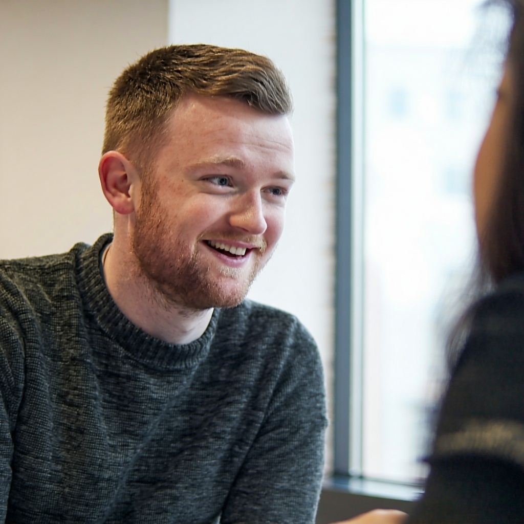 Irish startup founder talking with a colleague